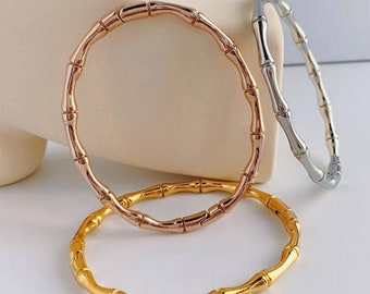 Armbanden van gemengd metaal in een gepersonaliseerde geschenkdoos