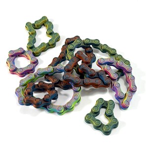 Juguete antiestrés con forma de cadena de bicicleta: juguete sensorial impreso en 3D para aliviar el estrés - Juego de 3 imagen 1