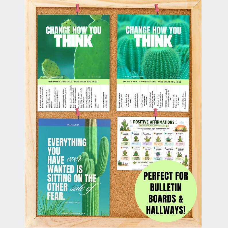 May include: A light wood cork bulletin board displays four printed cards featuring cactus imagery and motivational text. The cards include phrases like Change How You Think, Everything You Have Ever Wanted Is Sitting On The Other Side Of Fear, and Positive Affirmations, all pinned with small red pushpins.
