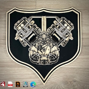 May include: A black and white detailed illustration of a V8 engine, with the word "Vintage" written on the top, is displayed on a wooden shield-shaped plaque.