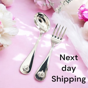 Handgjort set med sked och gaffel i 925 silver för baby, elegant böjd design