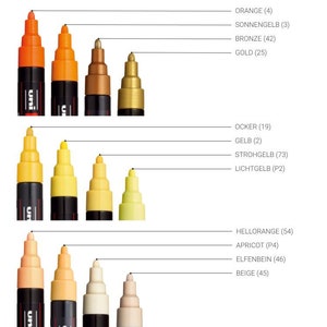 May include: A set of 10 paint markers with different colors, including orange, yellow, and beige. The markers are labeled with the color name and a number. The markers are arranged in rows of four, with the largest marker at the top and the smallest marker at the bottom.