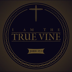 May include: A gold circle with a dark blue background and a gold cross at the top. The text "I AM THE TRUE VINE" is written in gold letters. The text "JOHN 15:1" is written in gold letters at the bottom.