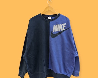vintage Nike Big logo sweatshirt Nike colourblock crewneck Nike sweater pullover streetwear sports style black purple colour size x-large