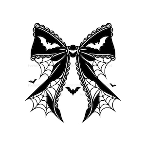 May include: A black graphic illustration of a bow featuring a lace-like scalloped edge, spider web patterns on the ribbon tails, and silhouettes of bats integrated into the design. A small oval bat emblem sits at the center of the bow knot.