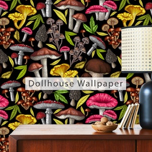 May include: A black and white wallpaper with a repeating pattern of mushrooms in various colors and styles. The wallpaper is displayed on a wooden surface with a lamp and clock in front of it. The text "Dollhouse Wallpaper" is printed on the wallpaper.