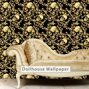May include: Black and gold wallpaper with a repeating pattern of skulls and ornate scrollwork. The wallpaper is displayed behind a beige chaise lounge.