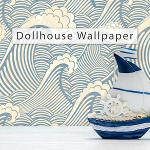 May include: Dollhouse Wallpaper with a nautical theme. The wallpaper features a repeating pattern of stylized ocean waves in shades of blue and cream. A small, decorative sailboat with a blue and white design sits in front of the wallpaper.