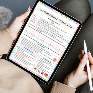 May include: A digital tablet displaying medical information about Second-Degree AV Block 2:1. The screen shows text, a heart rhythm graph, and lists of criteria, common causes, and treatment approaches. A stylus is held near the screen.