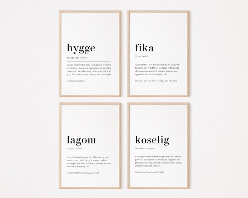 May include: Four black and white printable art prints with Scandinavian words and their definitions. The words are hygge, fika, lagom, and koselig.