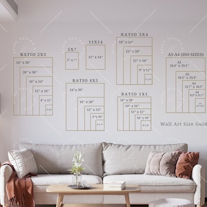 May include: Wall art size guide with various rectangular and square dimensions in inches, including 24" x 36", 20" x 30", 16" x 24", and 11" x 14". The guide also includes A1-A4 ISO sizes. The text "Wall Art Size Guide" is displayed.