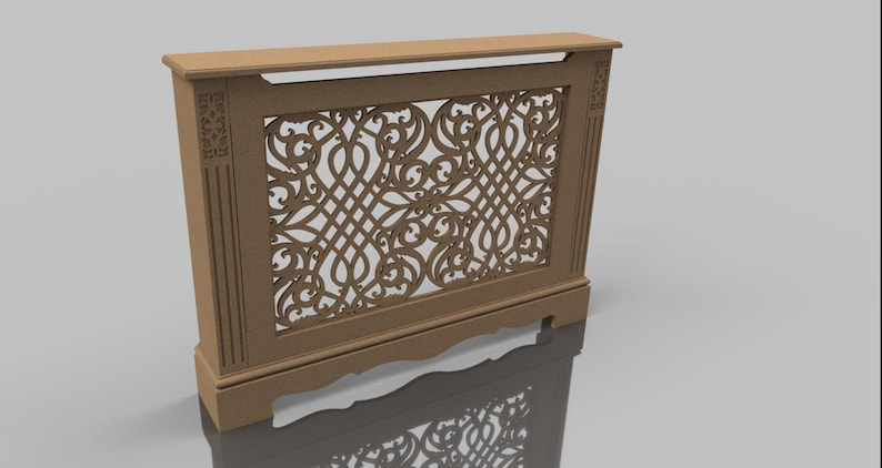 May include: A wooden radiator cover with a decorative, intricate cut-out design. The cover is a light brown color and has a rectangular shape.