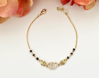 Conjunto de collar de cuentas negras Karimani Sara con circonita cúbica y pulsera Mangalsutra, joyería india, joyería de Bollywood, pulsera de corazón