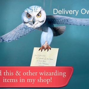 May include: A white snowy owl with blue markings is holding a letter addressed to Mr. H. Potter, The Cupboard Under the Stairs, 4 Privet Drive, Little Whinging, Surrey. The owl is flying with its wings spread out. The background is a light blue color. The text "Delivery Owl" is written in black letters at the top of the image. The text "Find this & other wizarding items in my shop!" is written in white letters on a red background at the bottom of the image.