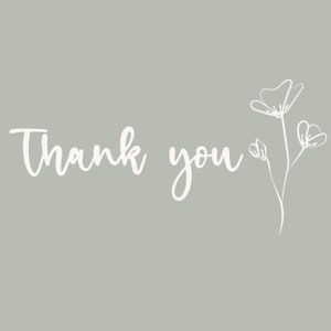 May include: A white thank you card with a simple line drawing of a flower on a light gray background.