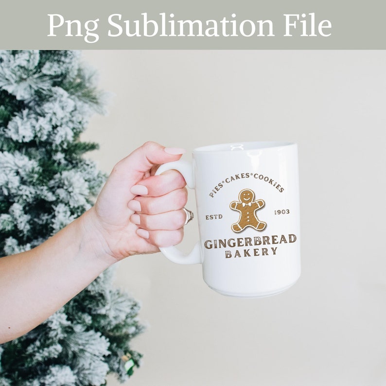 May include: White ceramic mug with a gingerbread man graphic and the text "Pies Cakes Cookies Estd 1903 Gingerbread Bakery".