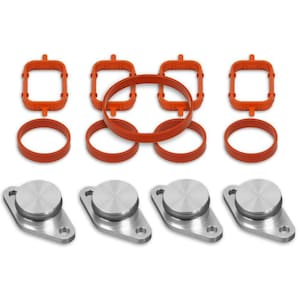 May include: An assortment of automotive parts, including four silver metal plates with circular tops and four orange rubber gaskets. The gaskets are in various shapes, including circles and squares.