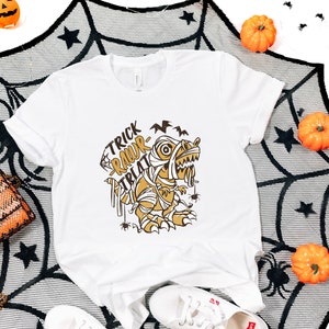 Funny Halloween Mummy T-rex T-shirt, Trick or Treat , Halloween Dinosaur Shirt, Spooky Gift for T-rex Lover, Scary Bat Shirt Halloween Party