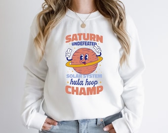 Saturn Undefeated Solar System Hula Hoop Champion, Funny Space Sweater, Long-Sleeve Unisex Sweatshirt, Funny Astronomy Gift for Women