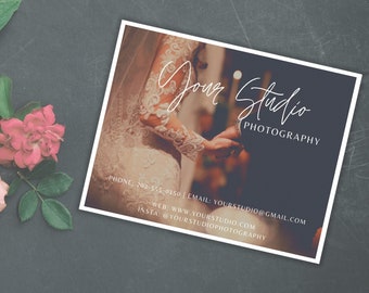 May include: A white business card with a photograph of a bride and groom. The text on the card reads "Your Studio Photography", "PHONE: 202-515-0150", "EMAIL: YOURSTUDIO@GMAIL.COM", "WEB: WWW.YOURSTUDIO.COM", and "INSTA @YOURSTUDIOPHOTOGRAPHY".