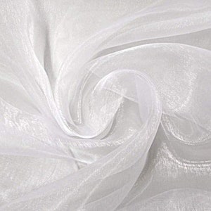 May include: White sheer tulle fabric with a soft, flowing texture. The fabric is translucent and has a delicate, almost iridescent sheen.