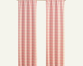 May include: A pair of pink and white gingham curtains with a rod hanging at the top.