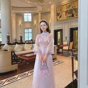 Prachtige gemoderniseerde paarse Ao Dai, Ao Dai Viet Nam, Áo Dài việt nam cao cấp