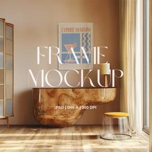 May include: A wooden cabinet with a curved front and a glass top. A framed poster with the text "Lychee Martini" is hanging on the wall above the cabinet. A lamp and a stool are also visible in the image.