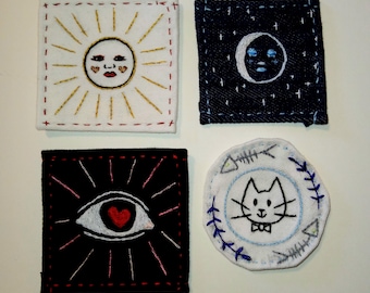 Various hand embroidered patches