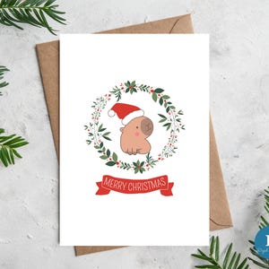 Grazioso biglietto di auguri natalizio a forma di capibara/Download digitale del biglietto di auguri natalizio a forma di capibara per gli amanti dei capibara/Download immediato del biglietto di auguri natalizio a forma di capibara