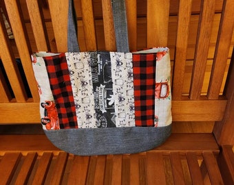 Designed bag with lining and zipper.