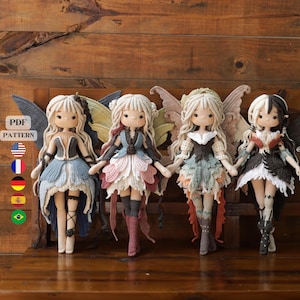 May include: Four crocheted dolls with wings, each wearing a unique outfit in shades of blue, pink, green, and black. The dolls have yarn hair and detailed clothing. Text on the left reads PDF PATTERN with flag icons, and @moonlightcrochet89 on the right.