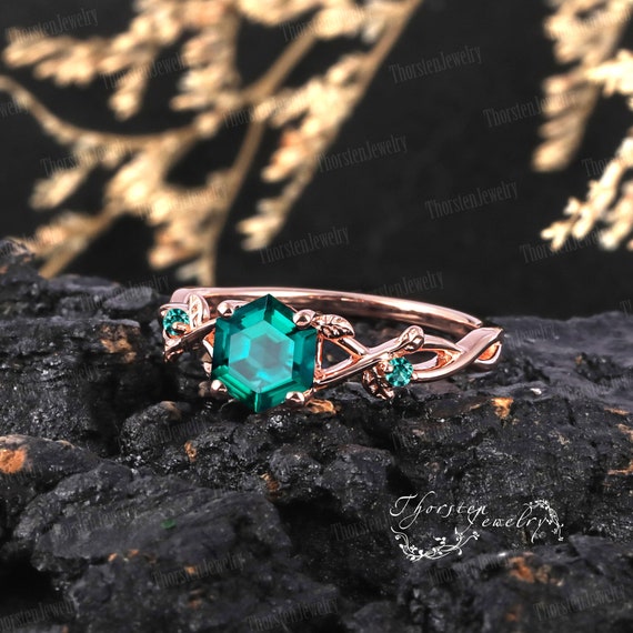 Bague de fiançailles en or rose 14 carats avec émeraude taille