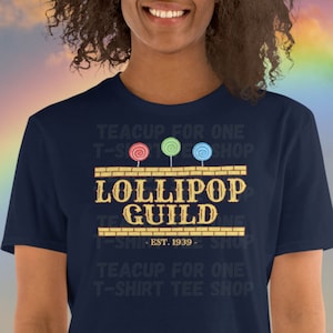 The Wizard of Oz Inspired Lollipop Guild Unisex T-Shirt | Munchkinland | Wicked | Literature | Parody Shirt | Yellow Brick Road