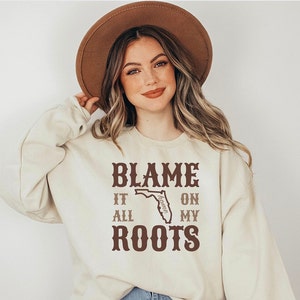 Sweat-shirt carte de la Floride, blâmer tout sur mes racines, pull graphique Sunshine State Home, tenue de musique country unisexe vintage, Southern Roots