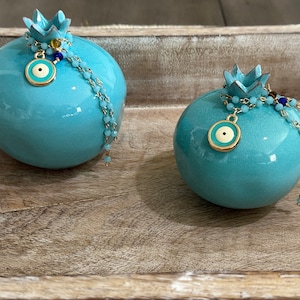 Ceramic Turquoise/pink  pomegranate with evil eye charm Large size