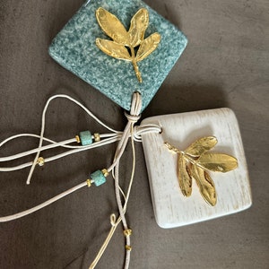 Decorative Paperweight in ivory and green / with golden olive leaf