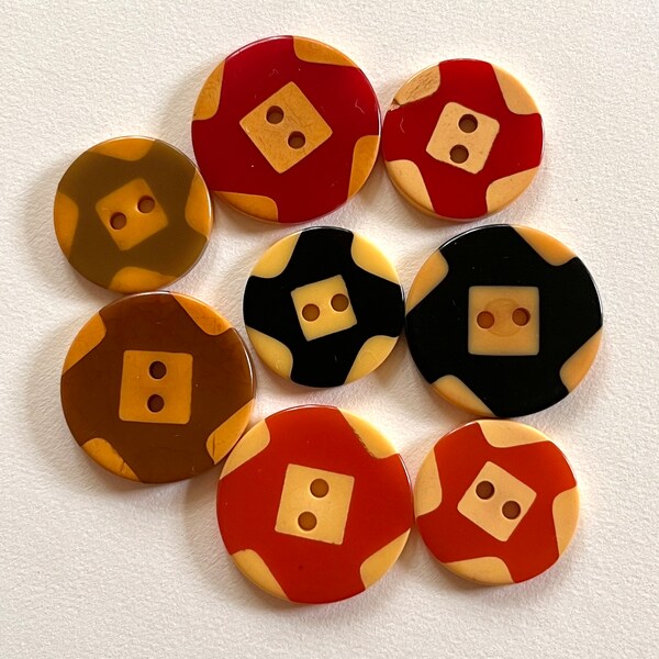 Bunch of 8 Colouful Bakelite Cookie Buttons. You get the 8 Buttons for the price.