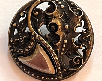 Antique Pierced Brass leaf and Fleur de Lys with Cut Steel Shield.