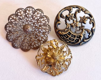 Three Antique Pierced Brass Buttons. You get the 3 for the Price.