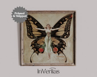 May include: A vintage art print of a woman with butterfly wings. The woman is wearing a green dress and has her arms outstretched. The butterfly wings are black and yellow with red accents. The print is framed in a wooden frame.