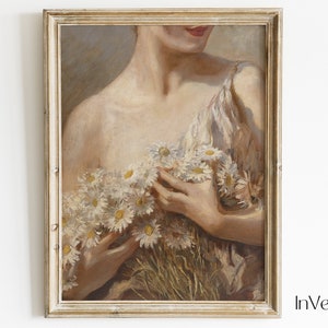 May include: A vintage painting of a woman holding a bouquet of white daisies. The woman is wearing a light brown dress and has her hair pulled back. The painting is framed in a light wood frame.