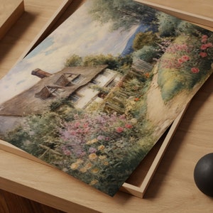 May include: A watercolor painting of a cottage with a thatched roof, surrounded by lush greenery and flowers. The cottage has a white exterior and a path leading up to it. The painting is done in soft, muted colors and has a romantic feel.