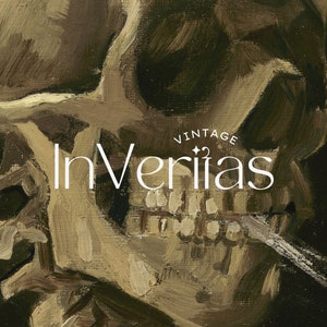 May include: A close-up of a painting of a human skull with a cigarette in its mouth. The skull is painted in a realistic style with visible teeth and a textured surface. The background is dark and the skull is illuminated by a light source from the left. The text "Vintage InVerias" is written in white letters on the skull.