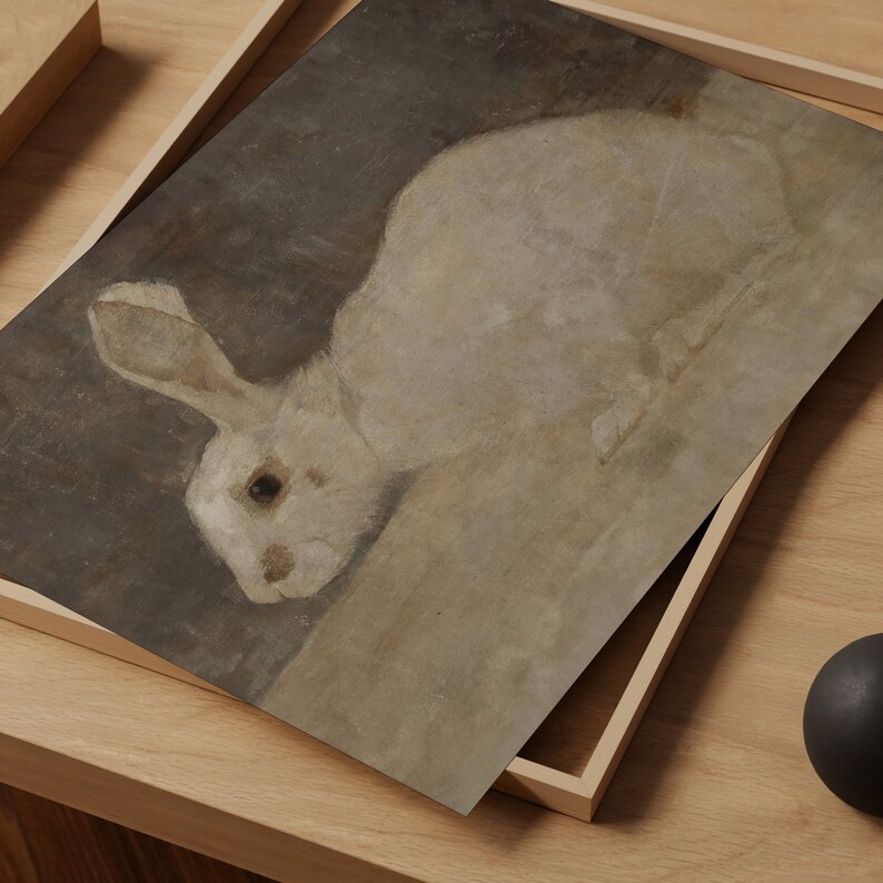 May include: A white rabbit with brown eyes is painted in a realistic style on a canvas. The background is a muted brown color.