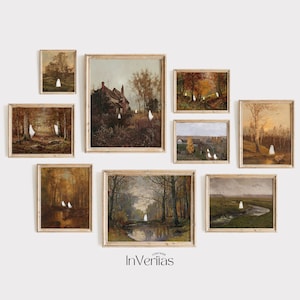 May include: A collection of eight framed vintage paintings with autumnal landscapes and ghostly figures. The paintings are arranged in a grid pattern on a white wall. The paintings are all in similar frames with a light brown wood finish.