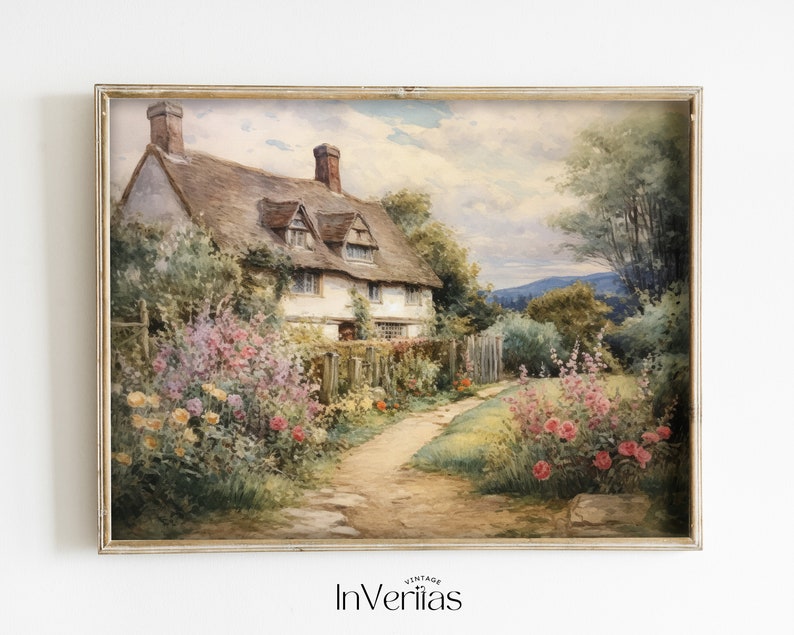 May include: A watercolor painting of a quaint cottage with a thatched roof, surrounded by a lush garden with blooming flowers. The cottage has a white exterior and a path leading to the front door. The painting is framed in a light wood frame.