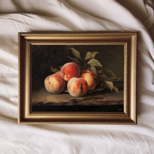 May include: A framed oil painting of a still life featuring five peaches on a plate. The peaches are a mix of red and orange hues, and the painting has a dark background.