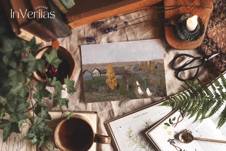 May include: A vintage-style print of a painting depicting a rural landscape with a few houses and a lone yellow tree in the foreground. Three white figures are walking along a path in the distance. The print is surrounded by books, plants, and other decorative items.