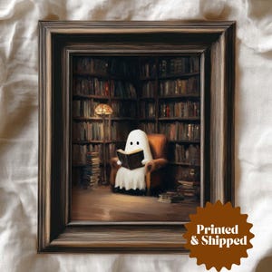a vintage style print of a little ghost reading a book in a moody old library